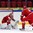 HELSINKI, FINLAND - JANUARY 2: Belarus' Ivan Kulbakov #31 stops the puck with Belarus' Stepan Falkovski #4 in front during relegation round action at the 2016 IIHF World Junior Championship. (Photo by Matt Zambonin/HHOF-IIHF Images)

